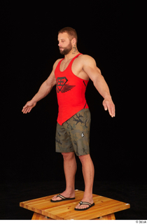 Dave camo shorts red tank top sandals standing whole body…